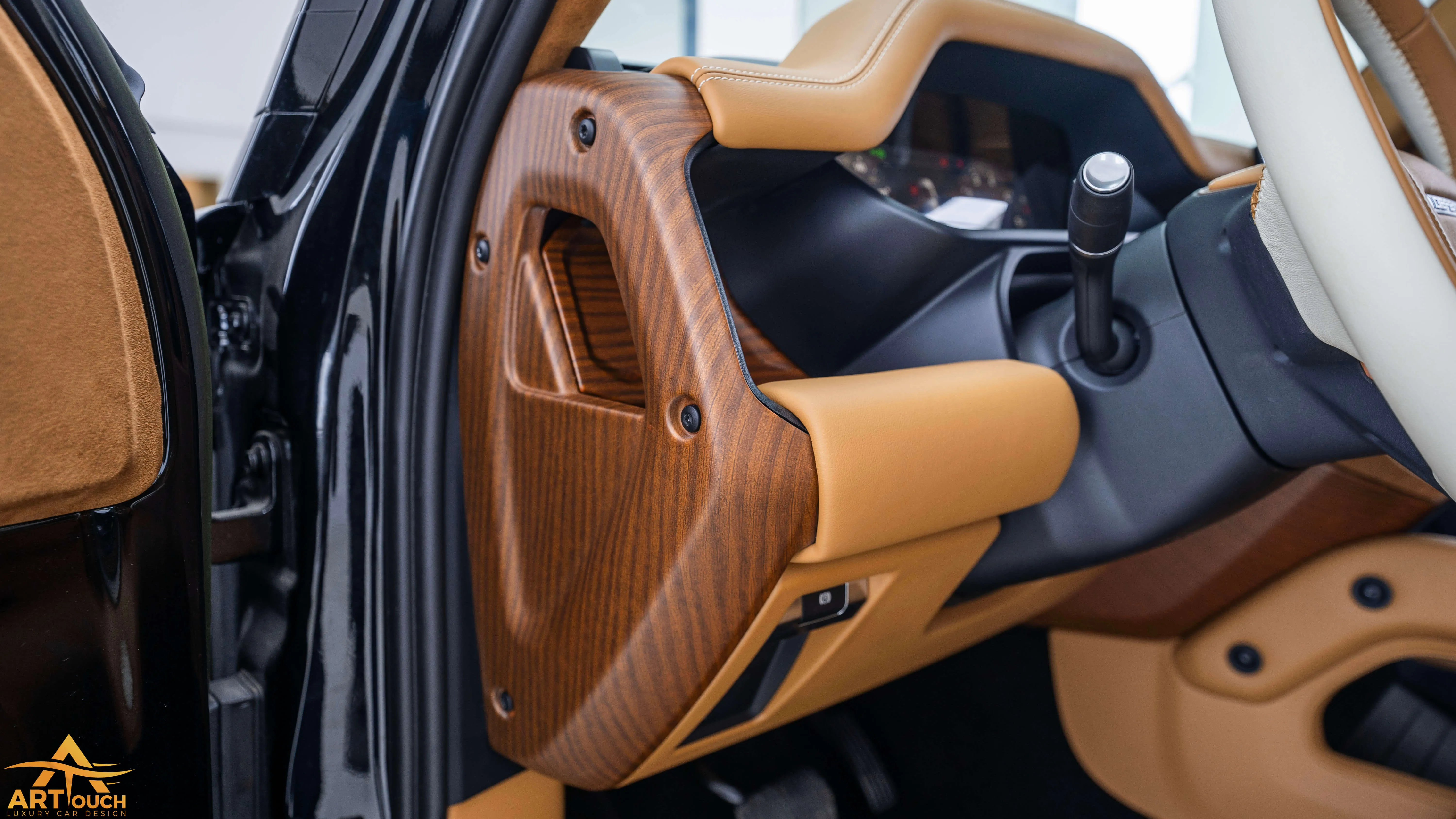 Bespoke Defender leather cabin. Premium Alcantara steering, custom gear knobs, and door panels crafted for a supreme luxury feel