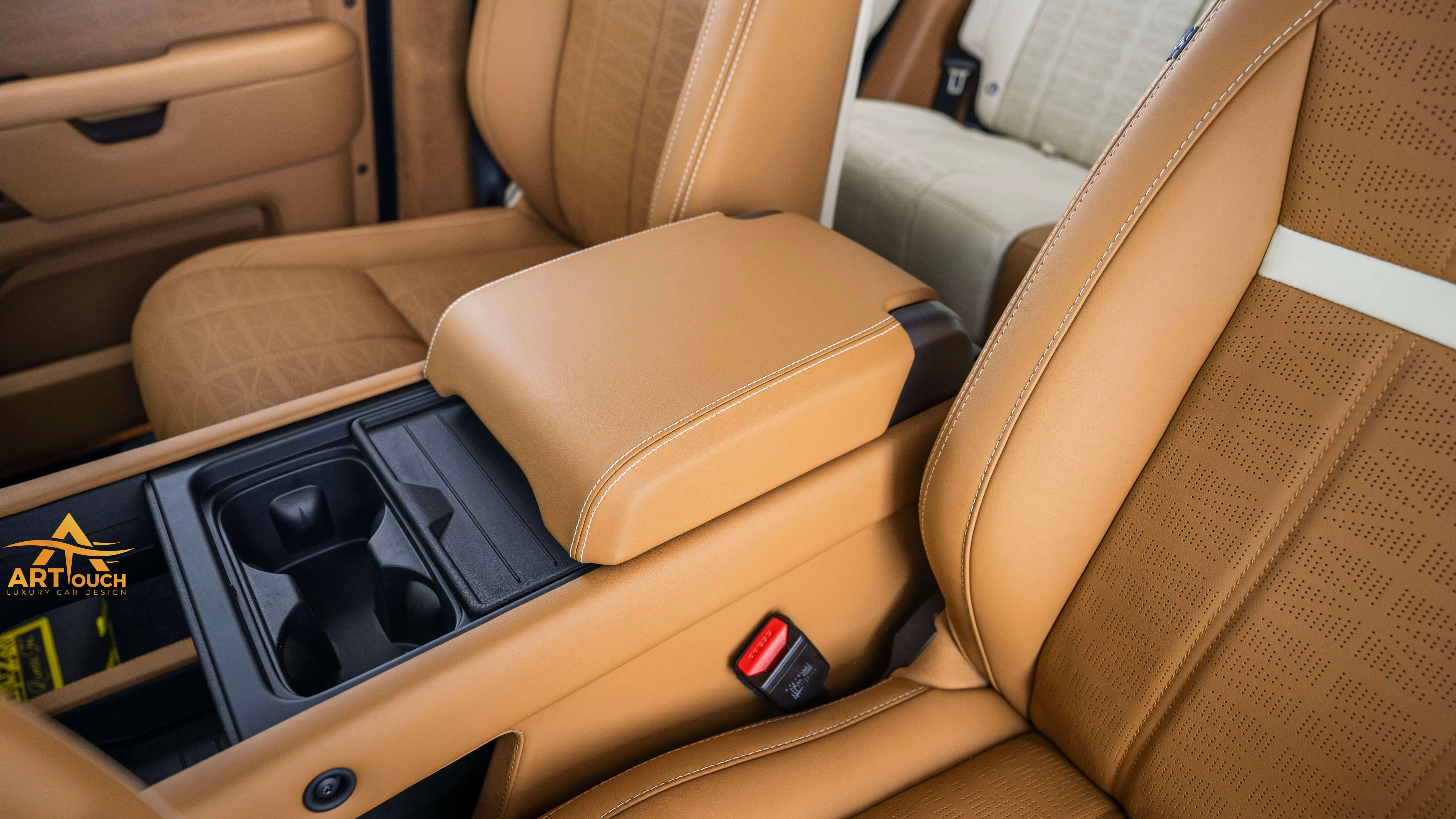 Bespoke Defender leather cabin. Premium Alcantara steering, custom gear knobs, and door panels crafted for a supreme luxury feel