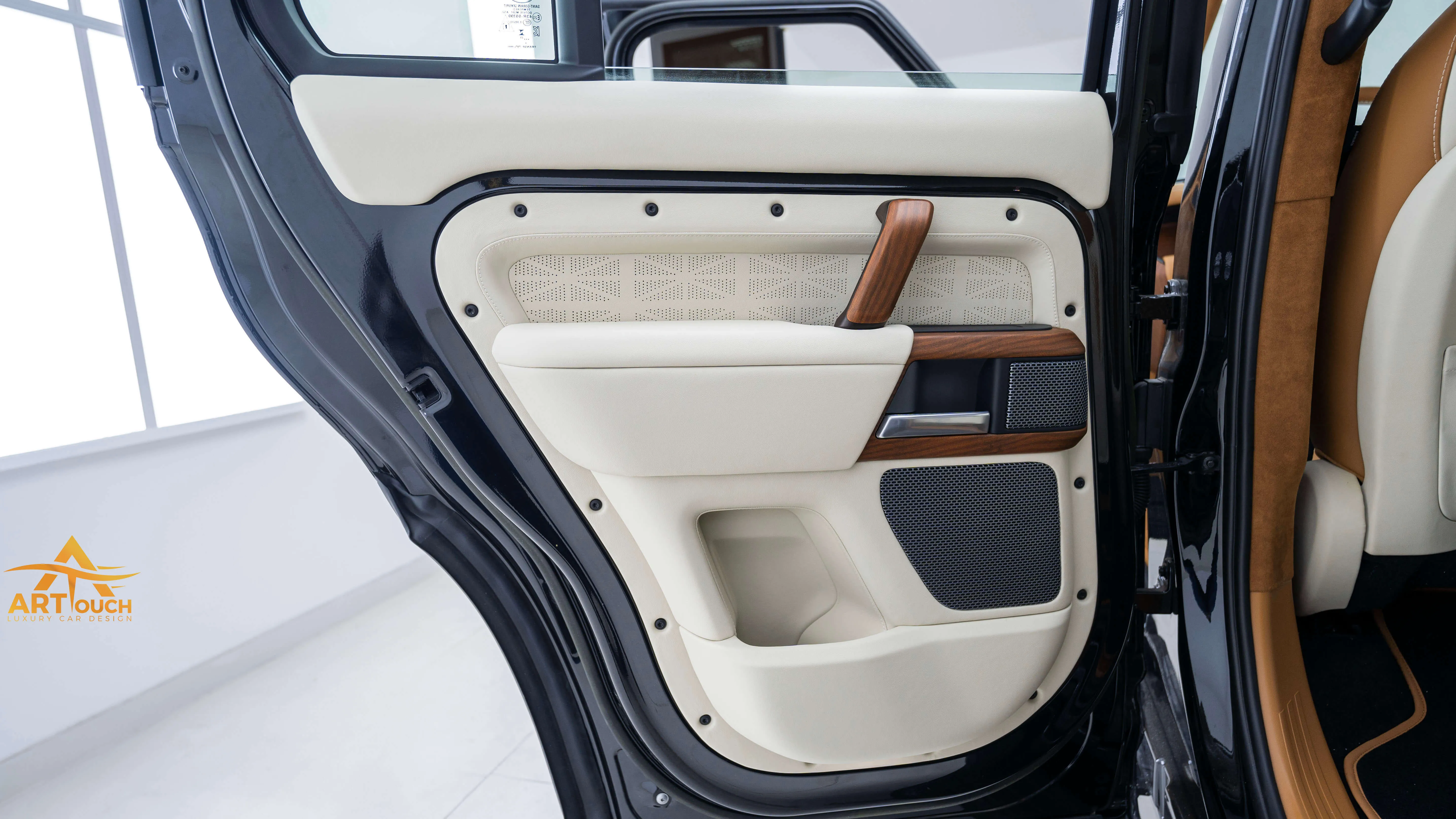Bespoke Defender leather cabin. Premium Alcantara steering, custom gear knobs, and door panels crafted for a supreme luxury feel