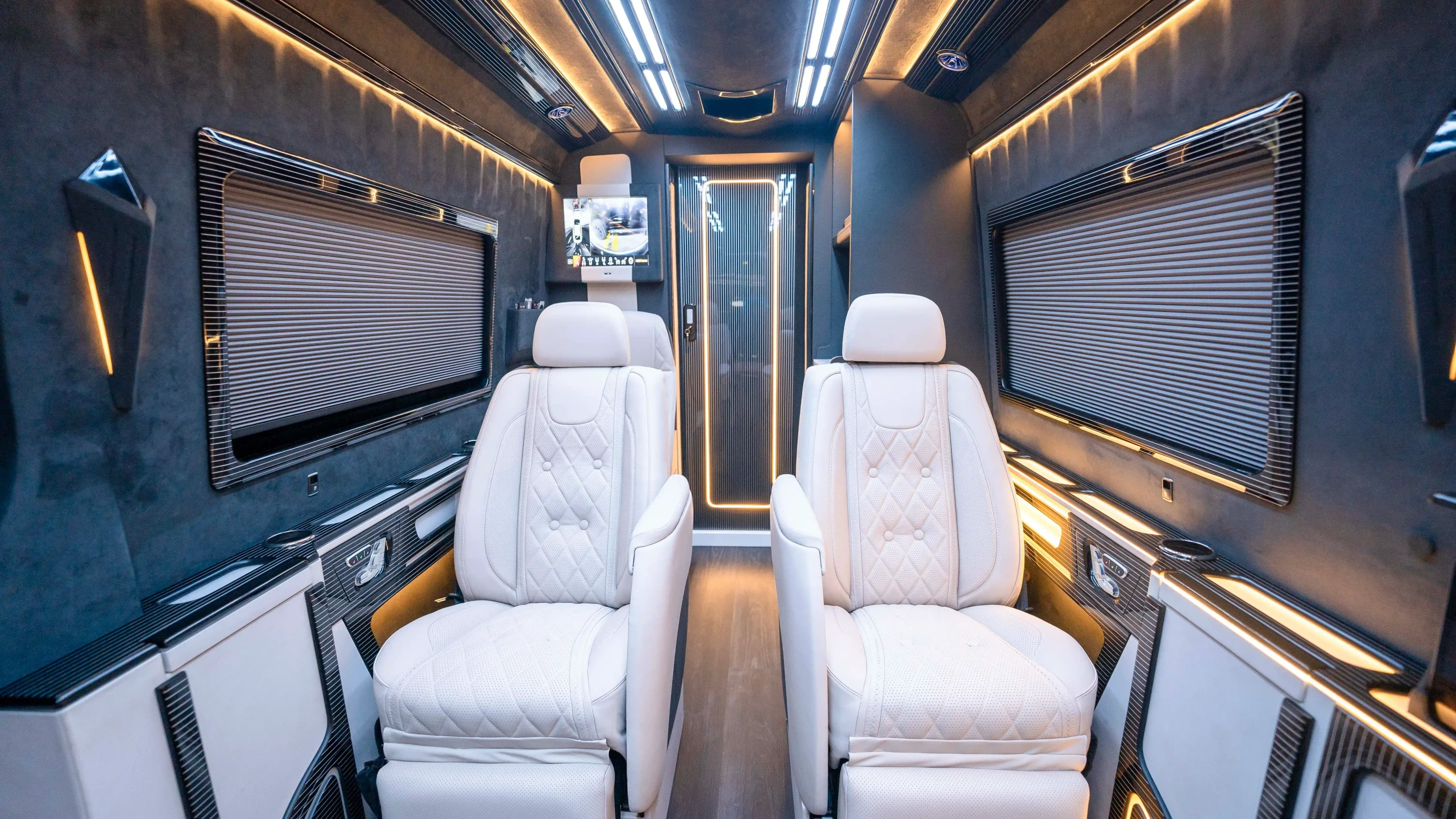 Mercedes Sprinter VIP Interior Upholstery Dubai – Custom White Nappa Leather and Black Alcantara Luxury Cabin Upgrade with Premium Reclining Seats